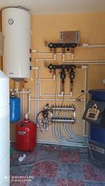 Установка котла Казак с современной системой отопления