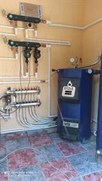 Монтаж системы отопления с котлом Казак